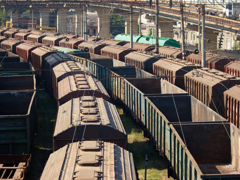 Perspective view cargo freight trains depot. Many freight train wagons.